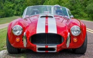 1965 Factory Five Mk IV Cobra Roadster Replica Red exterior with dual silver racing stripes