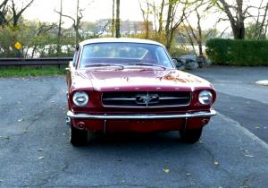 1965 Ford Mustang Fastback V8 289 red with a red interior