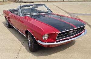 1967 Ford Mustang Candyapple Red with unique black striping