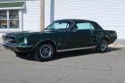 1967 Ford Mustang Dark Moss Green paint showing 4877 miles