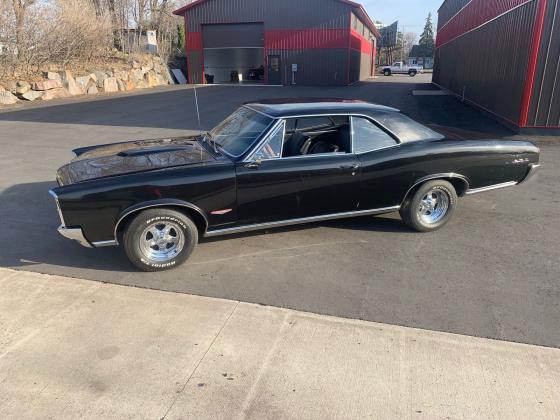 1966 Pontiac GTO 8 cyl 4 Speed Manual